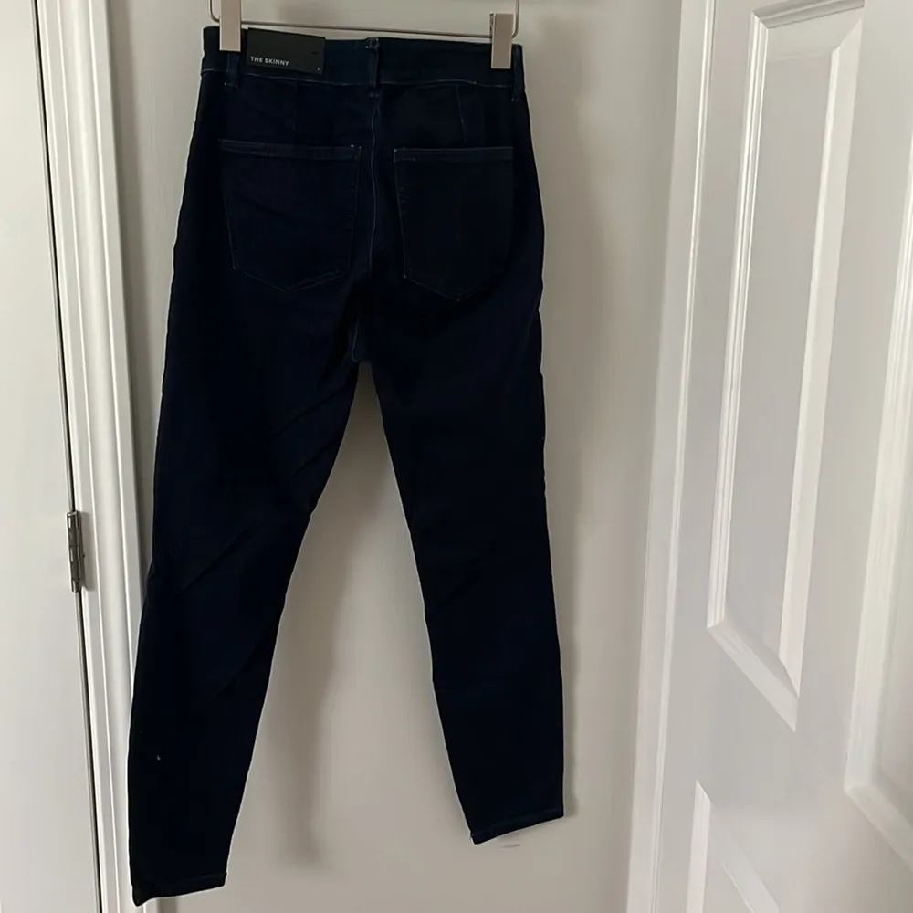 Ann Taylor the skinny with gold button details in size 6 in dark wash - Image 7