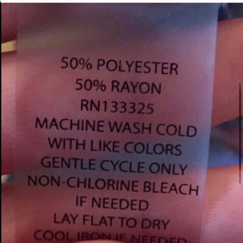 Delia’s floral scoop neck racerback tank top is perfect for adding a touch of style to your casual wardrobe. Made from a soft, breathable fabric, this tank features a beautiful floral design that can brighten up any outfit. The scoop neck adds a feminine touch, while the racerback style provides comfort and ease of movement. Ideal for layering or wearing on its own, this tank is versatile enough for any occasion, whether you're heading to the beach or running errands around town. - Image 5