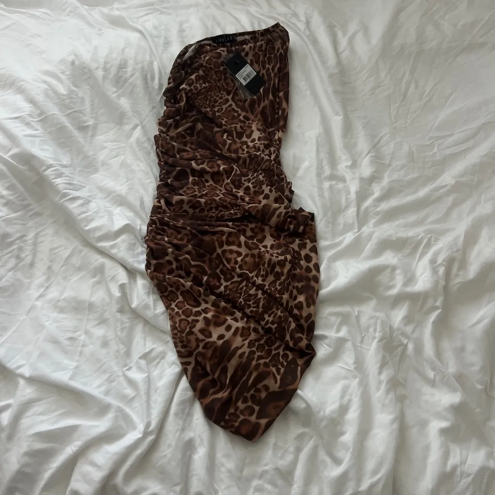 Lioness goddess midi skirt   Size XS  Condition: NWT  Color: leopard    Details - Image 2