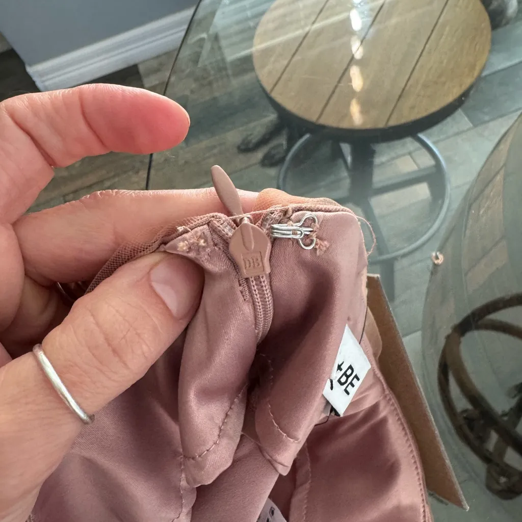 Do + Be Satin, chiffon mini skirt in size small
Elegant Pink Layered Skirt - Image 4