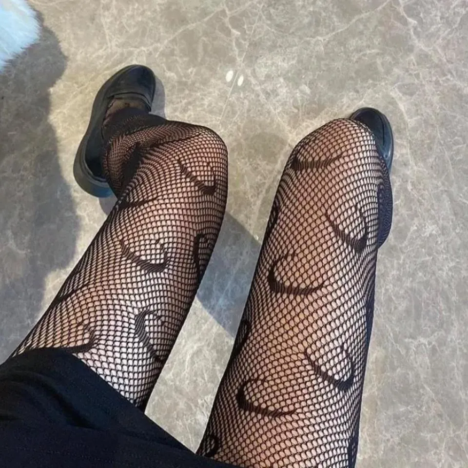 Women’s Sheer Moon Pattern Fishnet Tights - Image 2