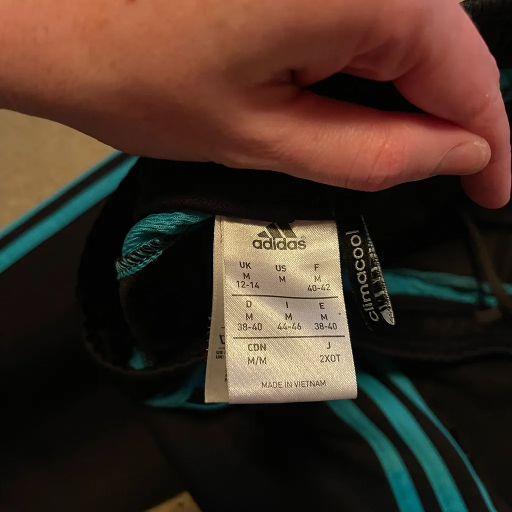 Adidas Black Joggers with Teal Accents - Image 4