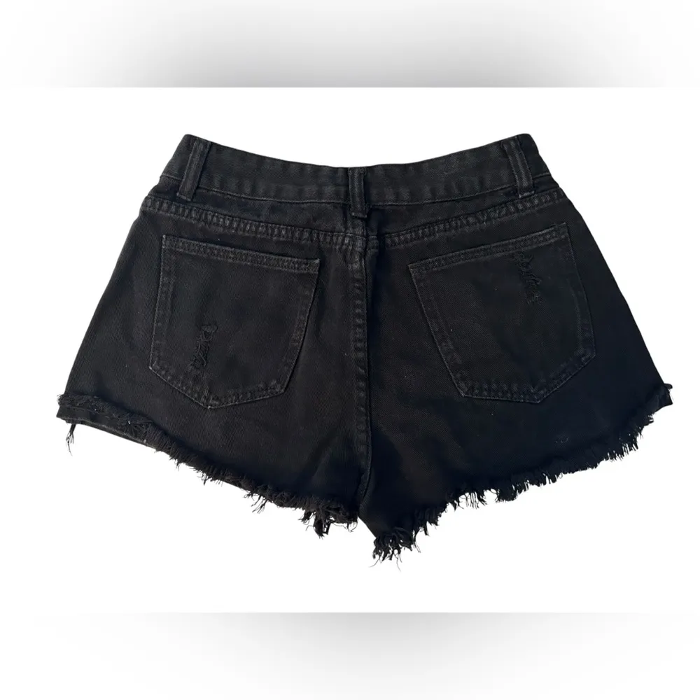 SHEIN Black Jean Shorts with Distressed Cut-Off Style - Image 3