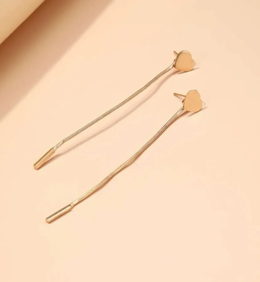 Long dangle, heart, tassel earrings Gold - Image 3