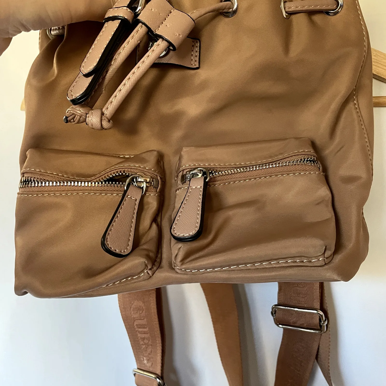 Guess LA brown leather backpack many pockets drawstring design flaw - Image 3