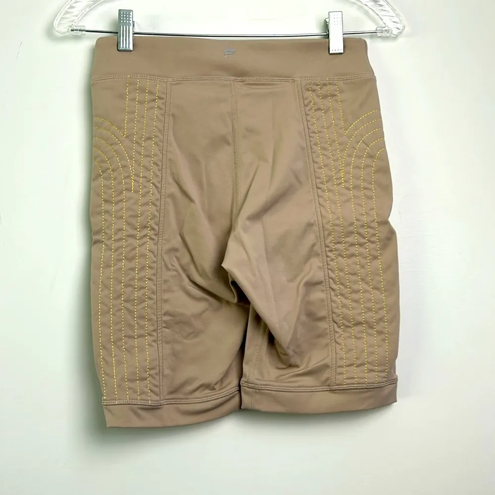 Fabletics| Tan Athletic Bike Shorts with Yellow Stitching on Side 9” sz Medium - Image 2
