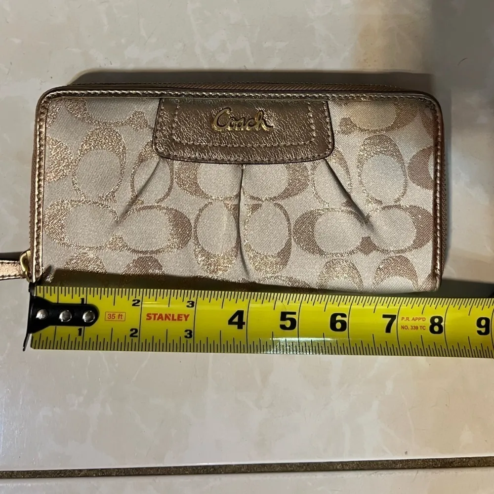 COACH signature Charlie C zip around wallet gold with purple interior - Image 4