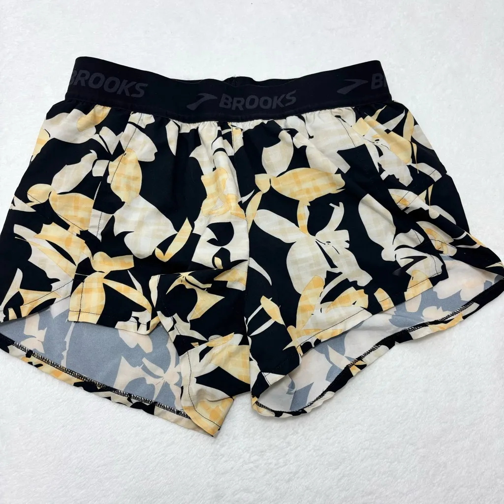 Brooks Women's Athletic Shorts with Black and Yellow Floral Pattern size S - Image 3