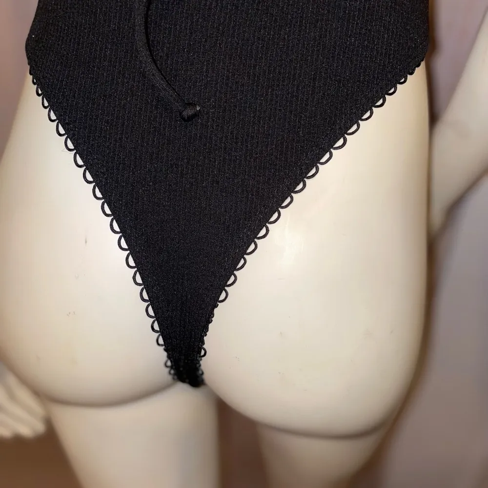LACE TRIM BLACK CHEEKY ONE PIECE BATHING SUITE WITH OPEN BACK SIZE SMALL - Image 5