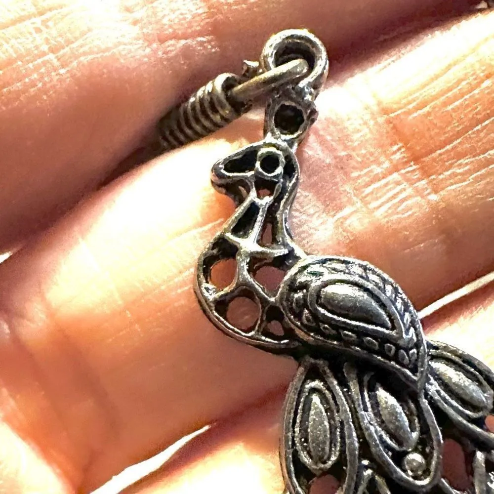 Silver tone peacock drop earrings - Image 7