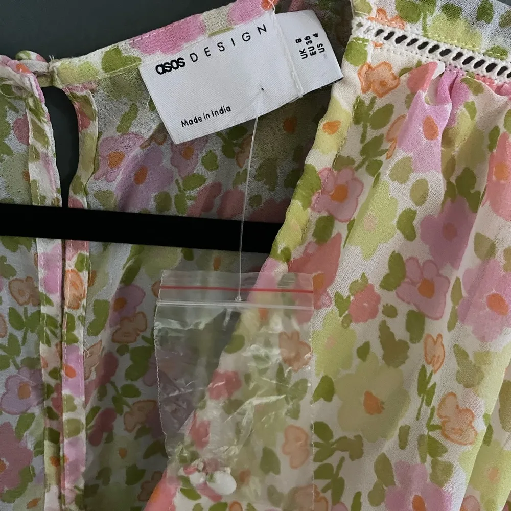 ASOS Design Button Front Long Sleeve Romper in 70s Floral - Image 8