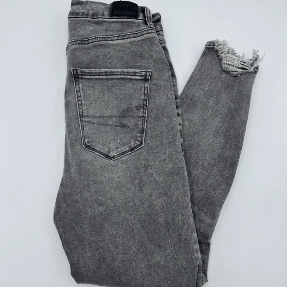 American Eagle Next Level Stretch grey black distressed skinny jeans raw hem - Image 2