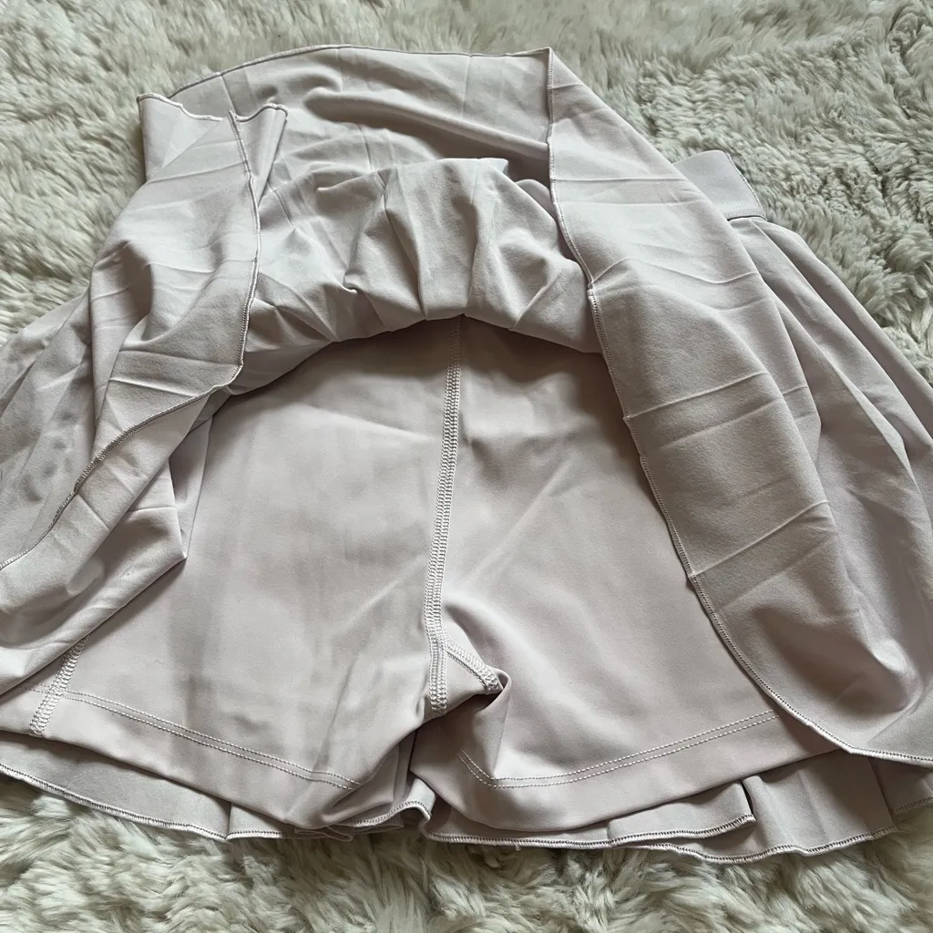 Aritzia  TnAction light lavender tennis mini pleated skort size S - Image 7