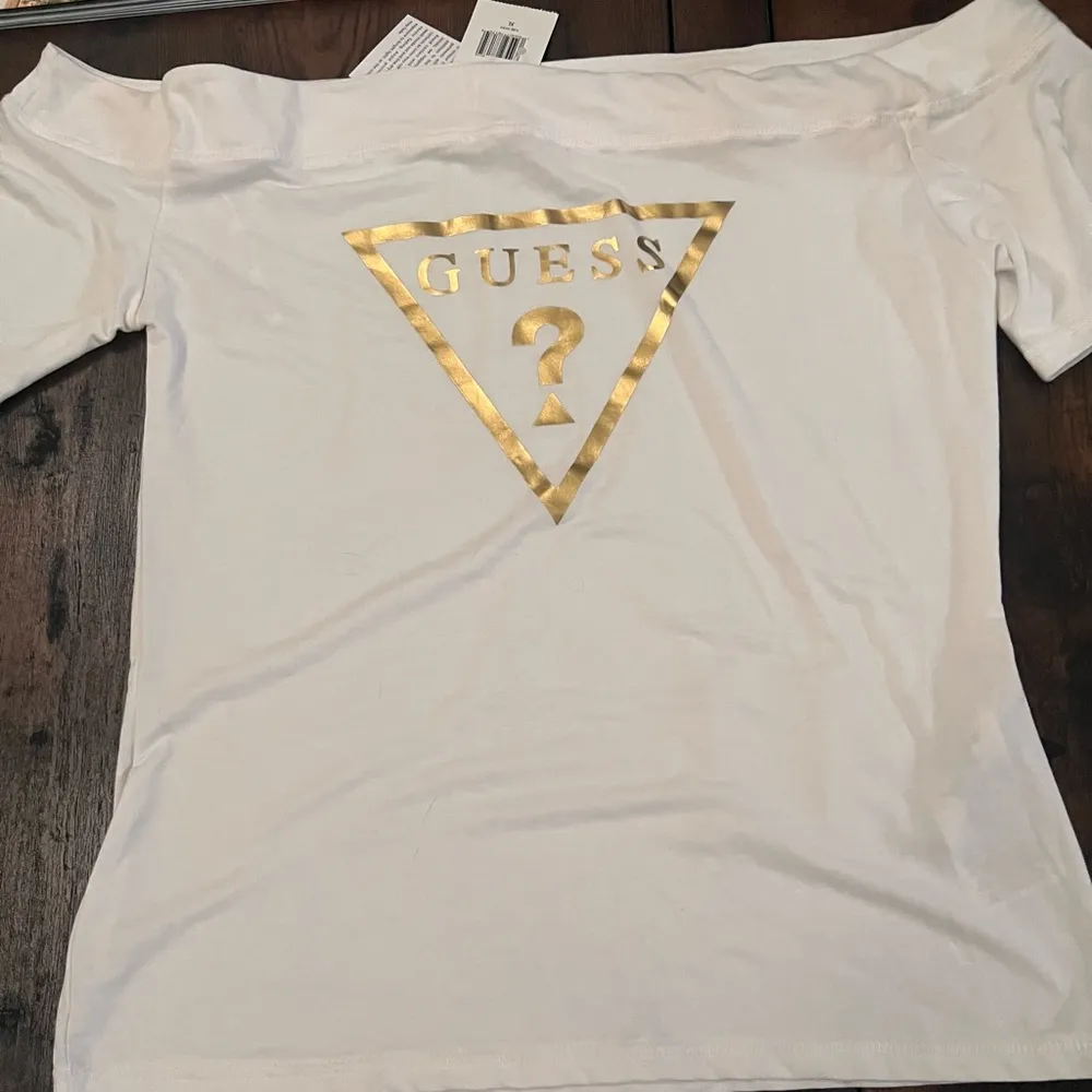 NWT Guess White Off-Shoulder Top with Gold Logo - Image 4