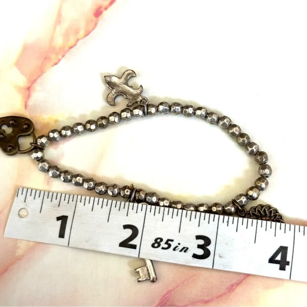 Silver/brass tone charm stretchy bracelet - Image 3