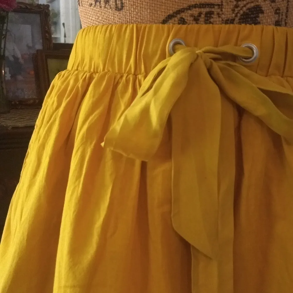 Anthropologie Odille Drawing Parallels Pleated Pocket Skirt in Marigold Yellow - Image 11
