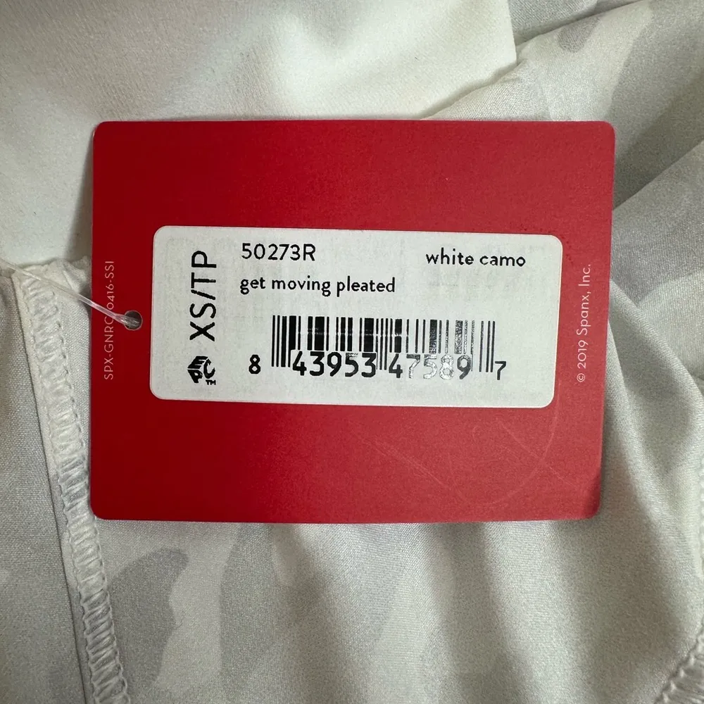 Spanx Get Moving Pleated Mini Skort White Camo Athletic Activewear size XS - Image 5