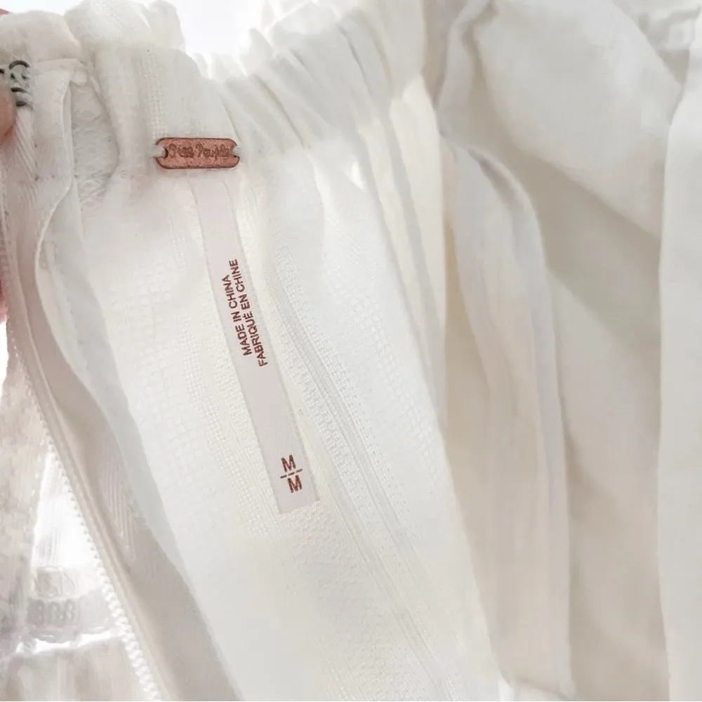 Free People Frills and Thrills One Piece Strapless Romper in White - Image 9