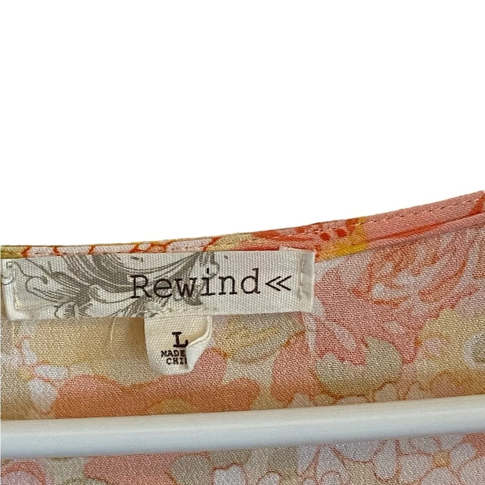 Rewind Button Front Flutter Sleeve Skater Dress
orange yellow florals Fairy core - Image 4