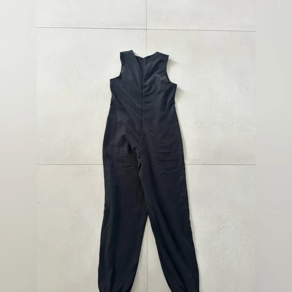 Black High Neck Sleeveless Jumpsuit with Tapered Legs - Image 3