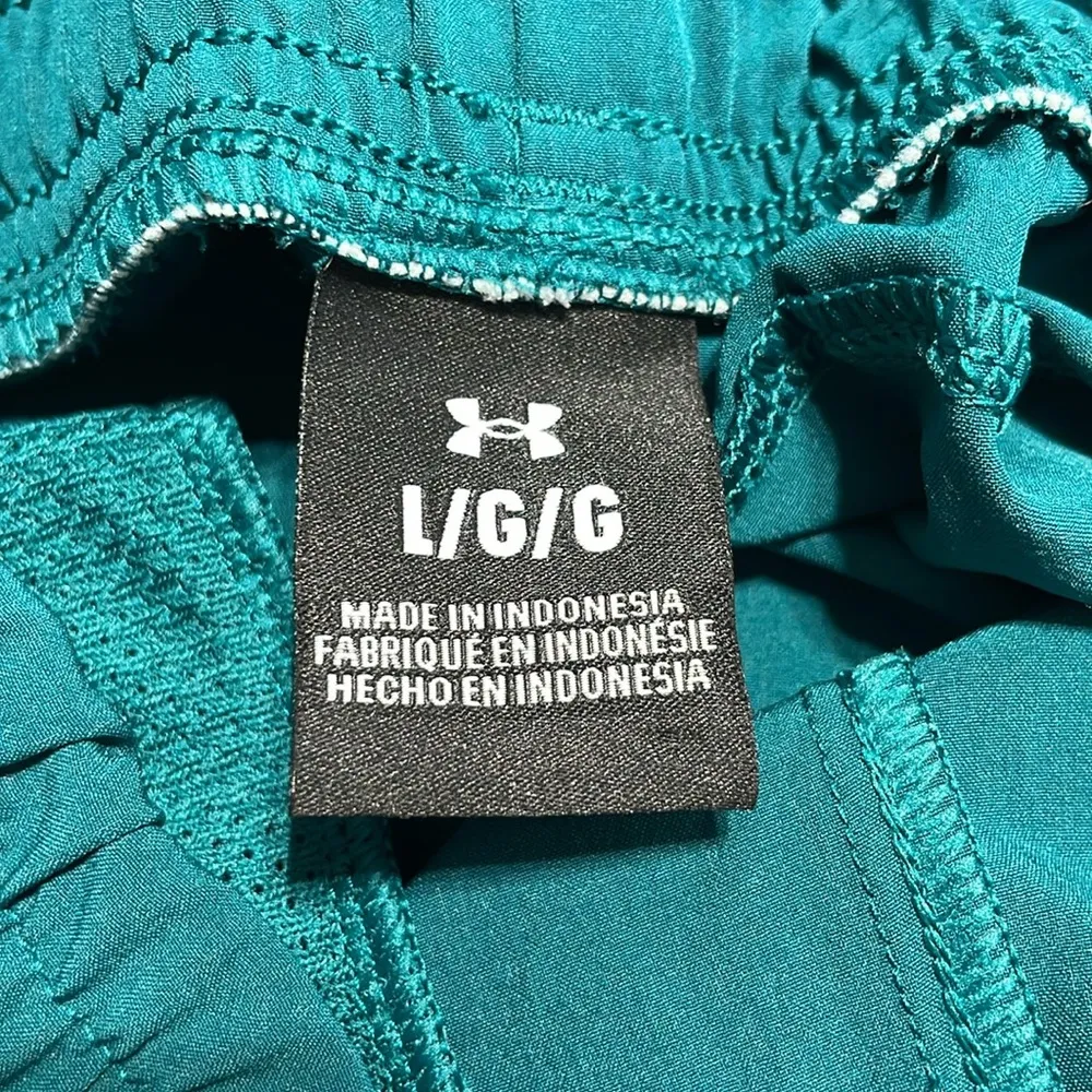 Under Armour®
Fly By 3" Shorts Teal green size large RN 96510 - Image 7