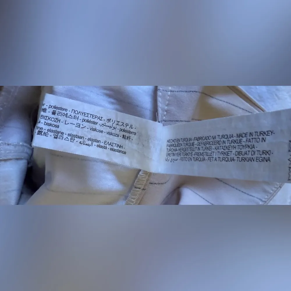 Zara Pleated Skort features a high waist, wrap front, side buckle, pleat details - Image 13