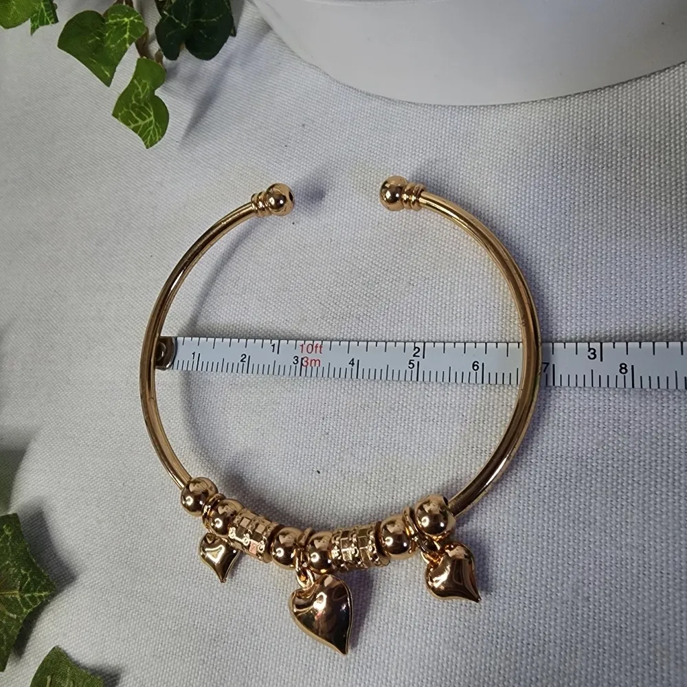 Gold Steel Open Cuff Bracelet with Heart Charms - Image 7