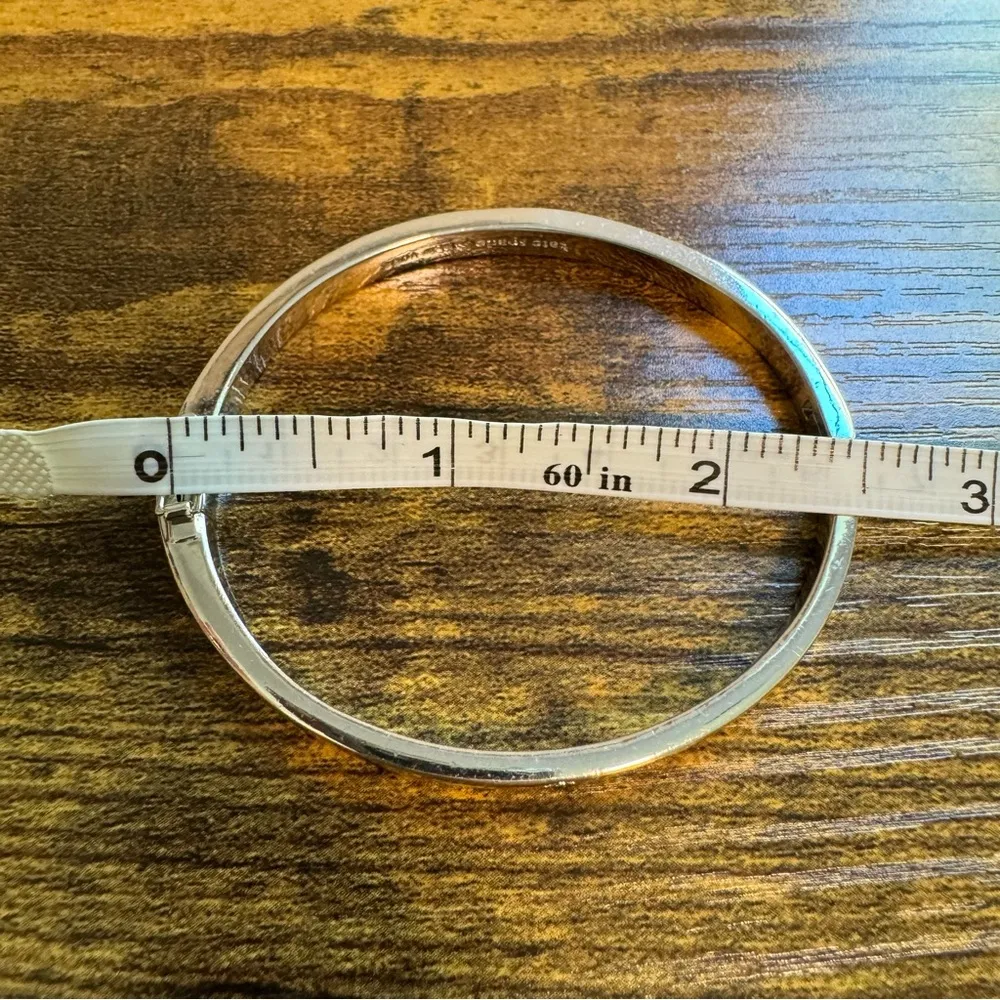 Kate Spade Silver Plated Cut Out Logo Clamper Cuff Bracelet - Image 6