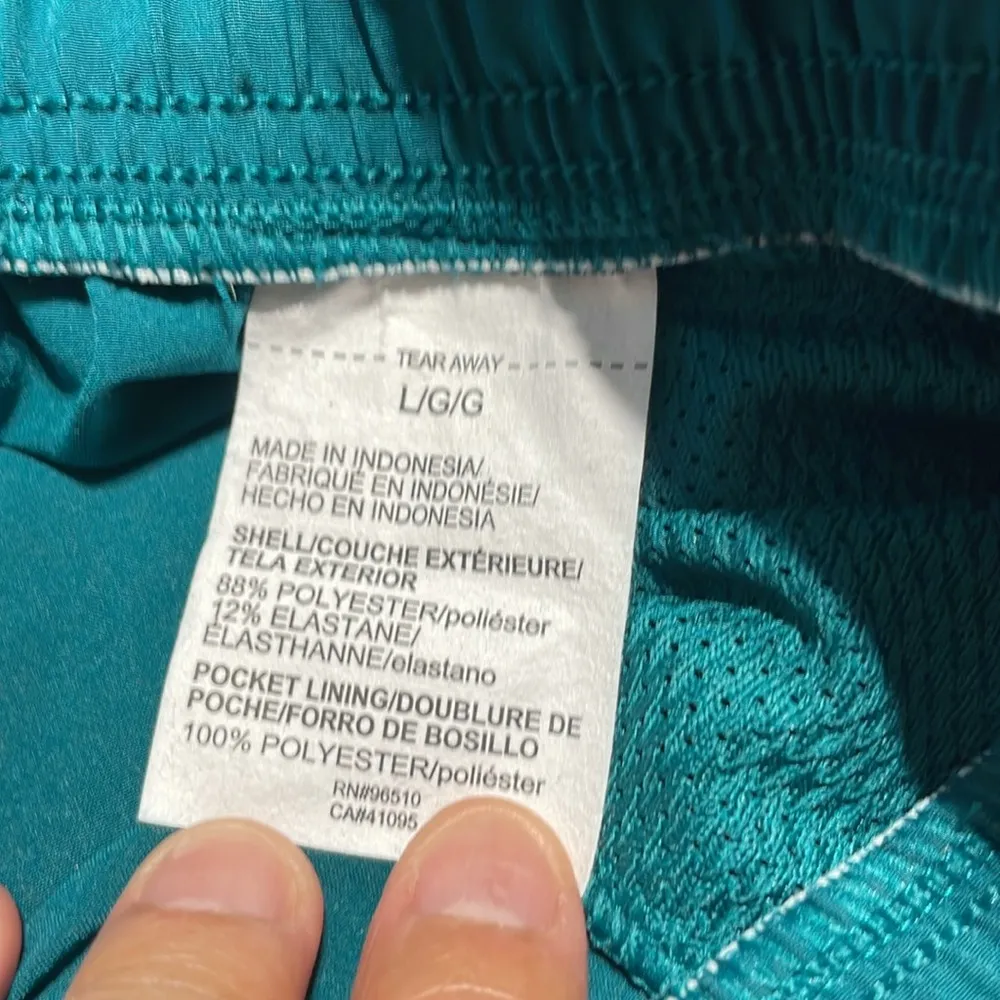 Under Armour®
Fly By 3" Shorts Teal green size large RN 96510 - Image 8