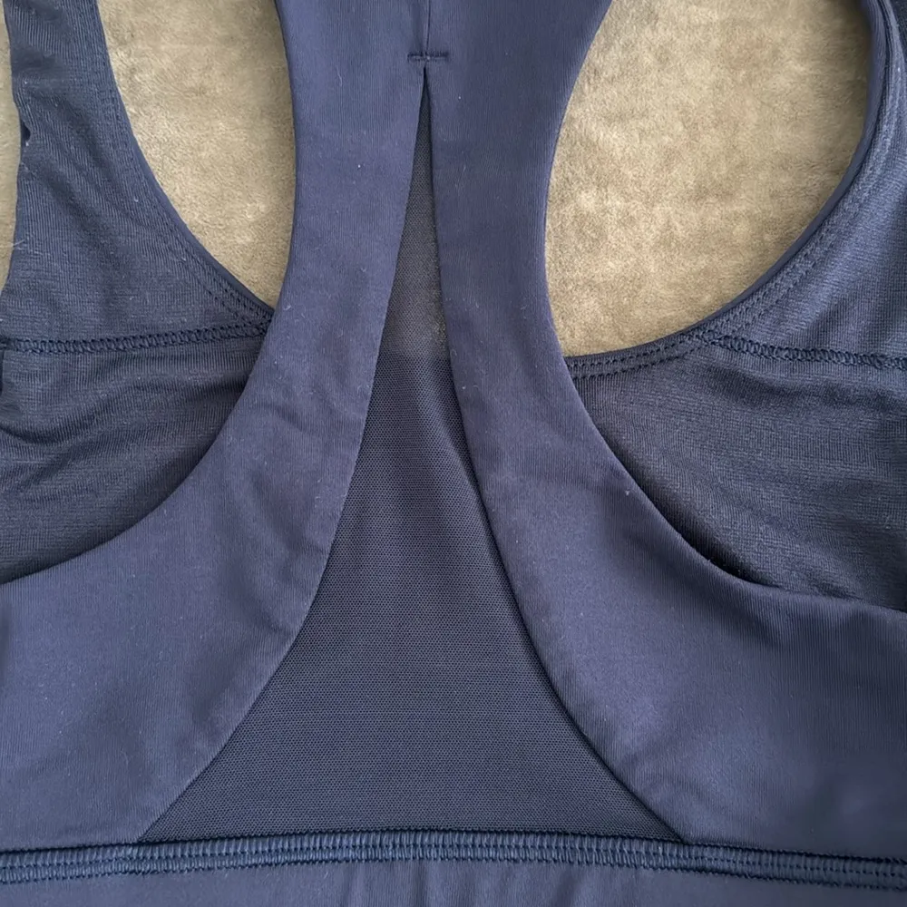 Lululemon Athletic Invigorate Racerback Sports Bra color- Navy. Size 2 - Image 4