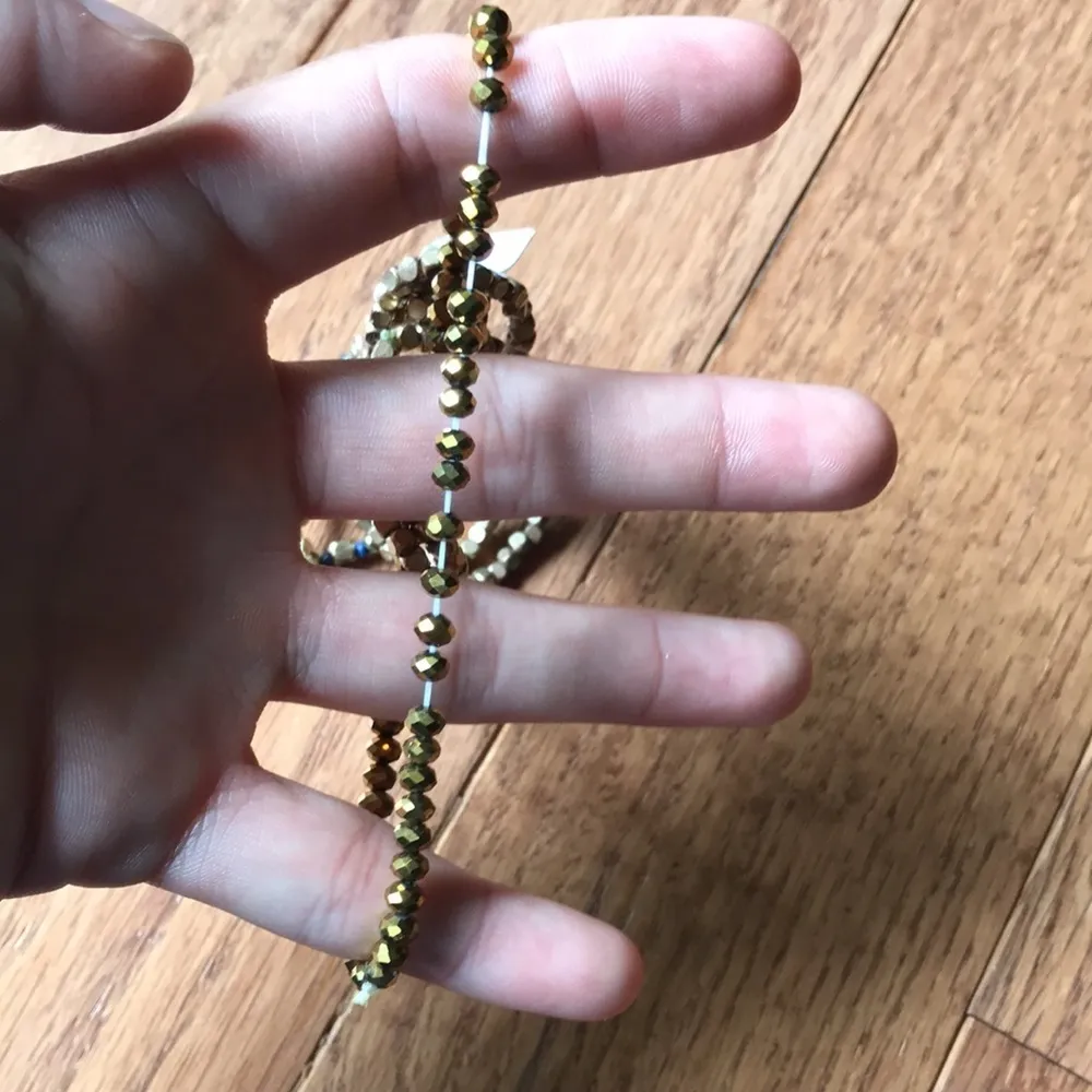 Set of 5 gold stretchy bracelets - Image 3