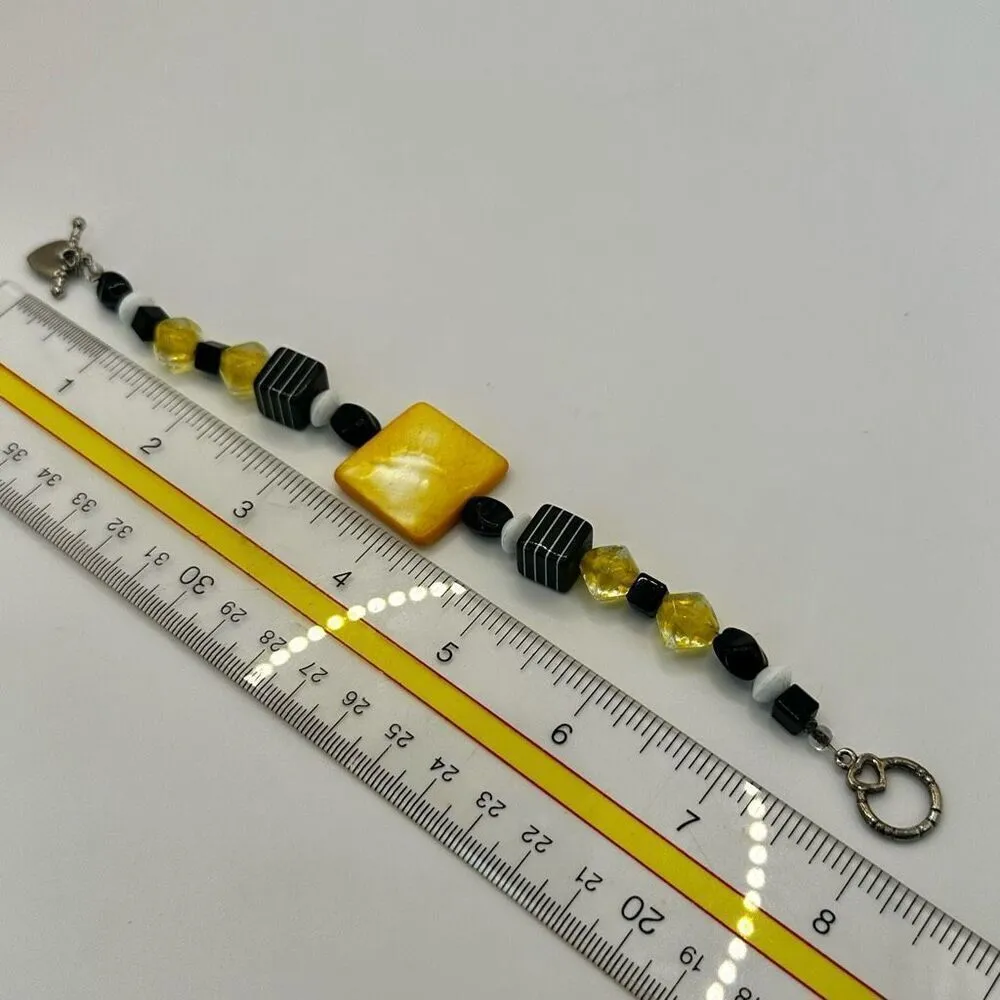 Yellow abalone and black beaded bracelet - Image 7