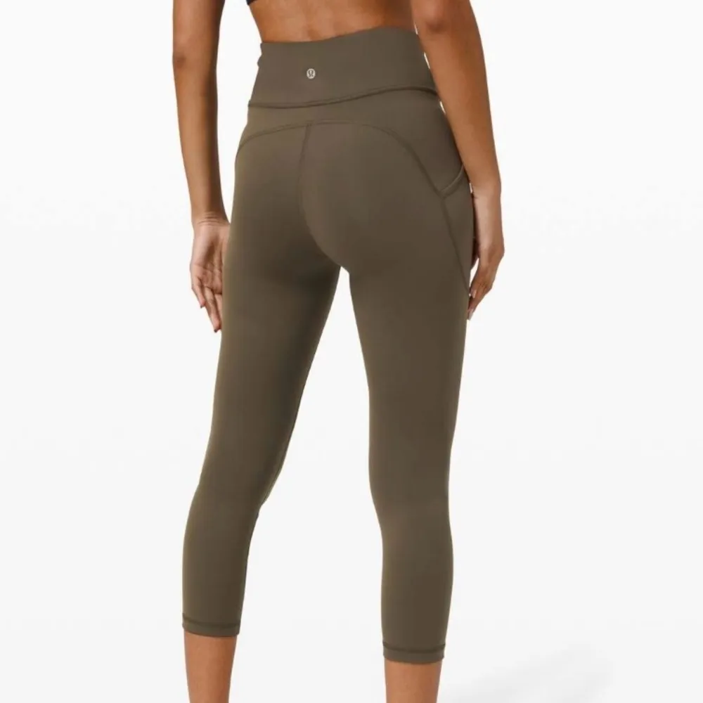 Lululemon Invigorate Everlux HR Crop 23” Olive Green Leggings Like New Size 8 - Image 4