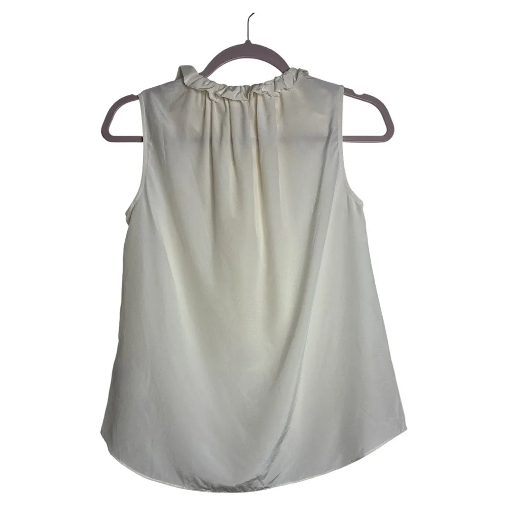 Kate Spade Cream Ruffle Neck Blouse
100% Silk - Image 3