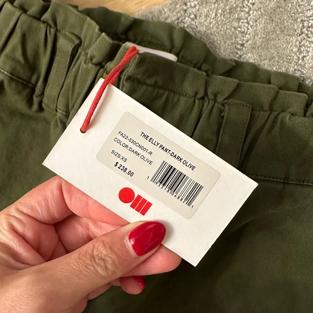 solid and a striped green olive pant - Image 6