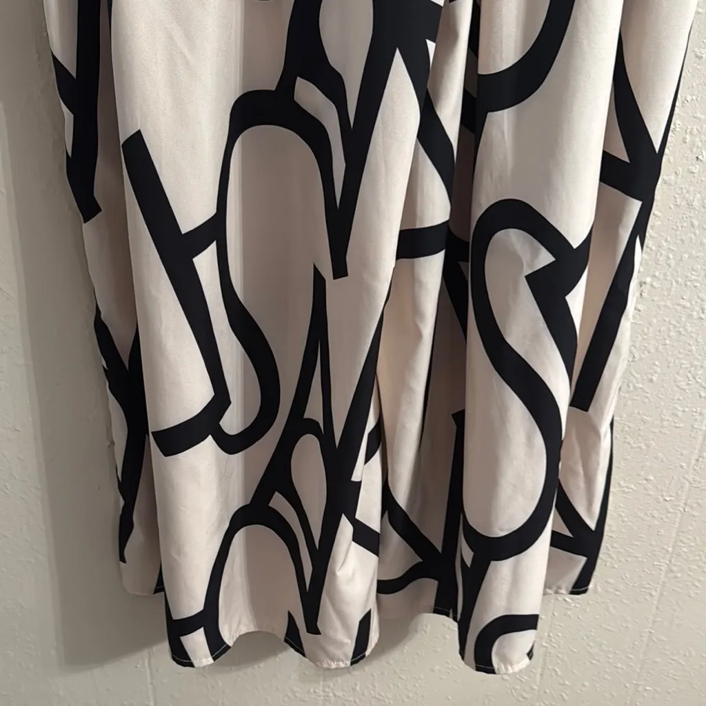 Elegant Black and White Wide Leg Pants Size L - Image 7