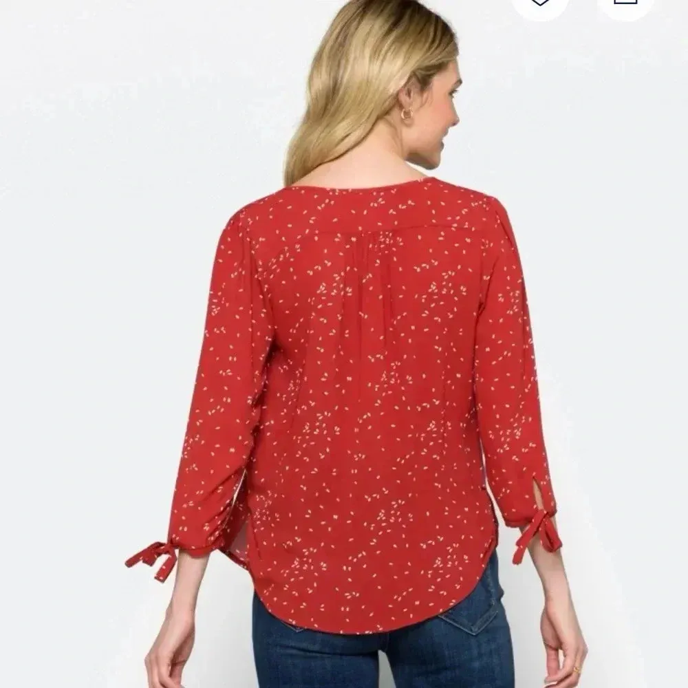 Fun2fun rust colored shirt with a cream colored design size small. - Image 3