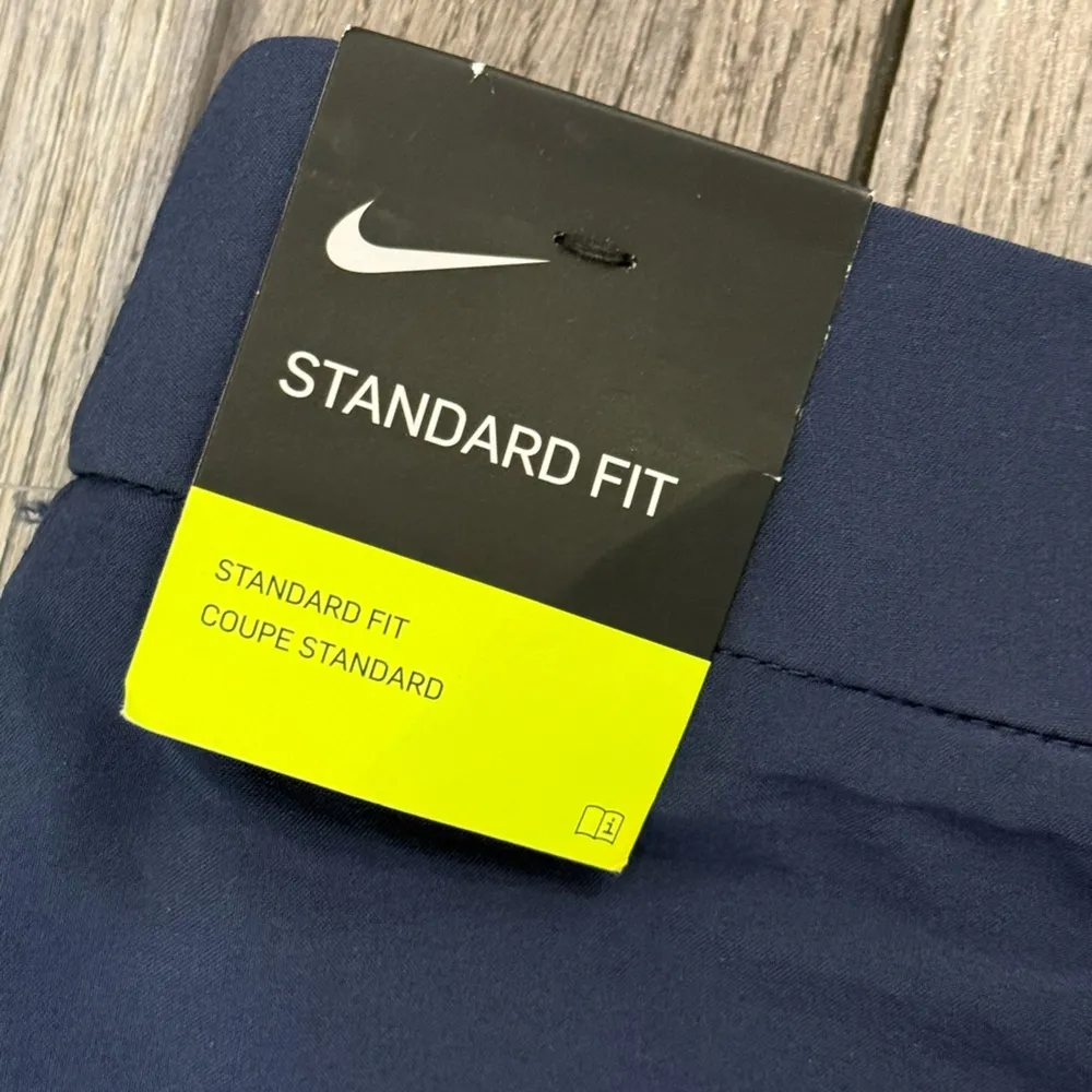 NEW! NIKE GOLF FLEX Women's Navy Shorts Standard Fit Pleated Pockets 7" Inseam - Image 5