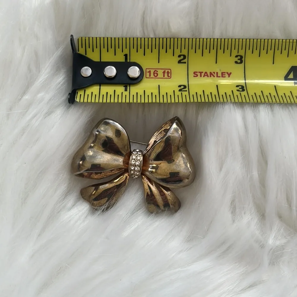 Gold tone bow brooch with crystal rhinestones - Image 3