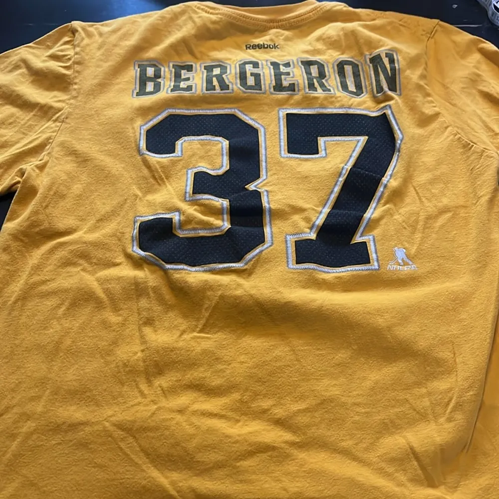 NHL Patrice Bergeron tshirt. Boston Bruins captain 2023. Good preowned condition Yellow Size XL - Image 2