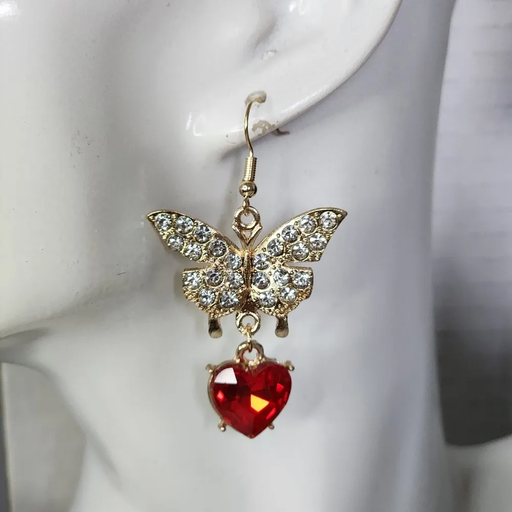 Gold Butterfly Earrings with Clear Crystal Sones and Red Crystal Heart Drop - Image 5
