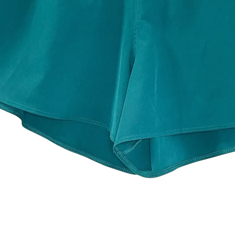 Under Armour®
Fly By 3" Shorts Teal green size large RN 96510 - Image 5