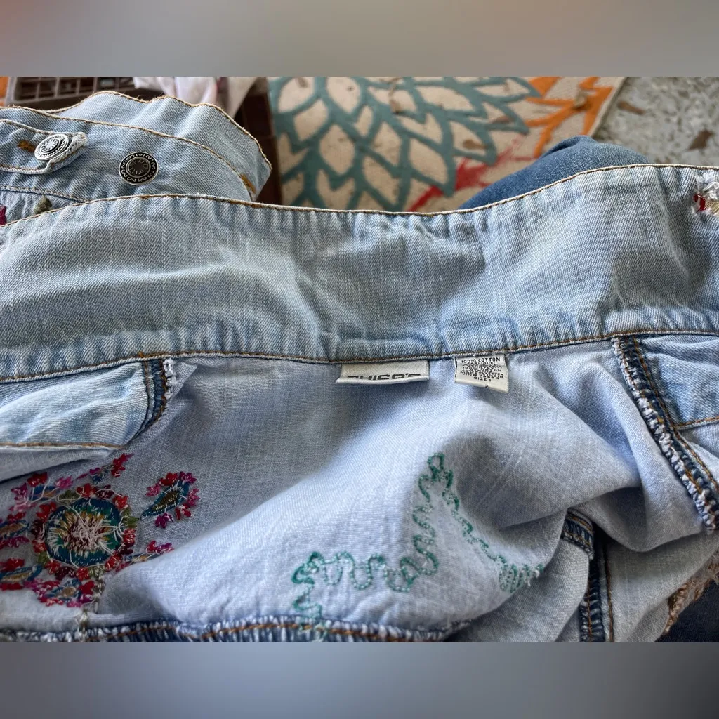 Chicos light wash distressed denim vest with boho patchwork appliqués. Size 1. - Image 11