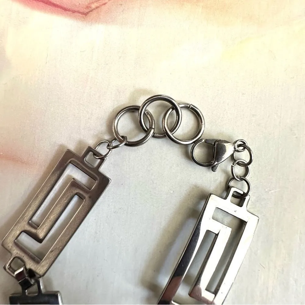 Stainless steel silver tone Greek key design bracelet - Image 3