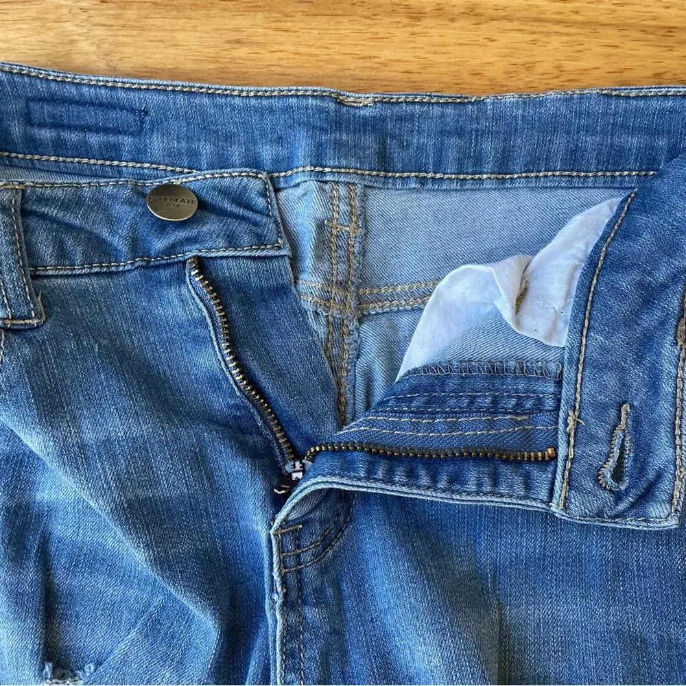 Distressed Blue Skinny Jeans by the brand Chocolate USA in Size Small - Image 3