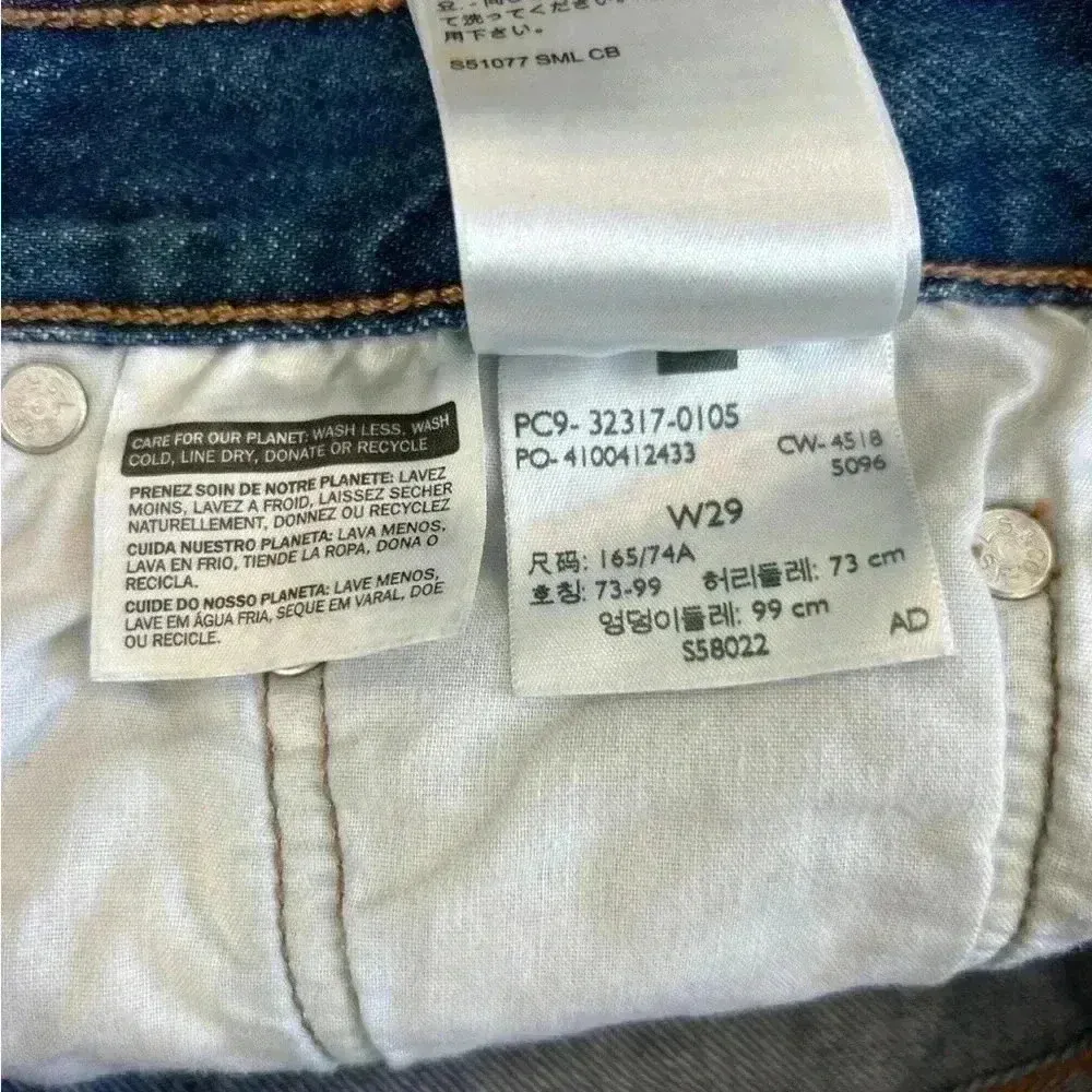 Levi’s button front high rise blue denim shorts in size 29 - Image 6