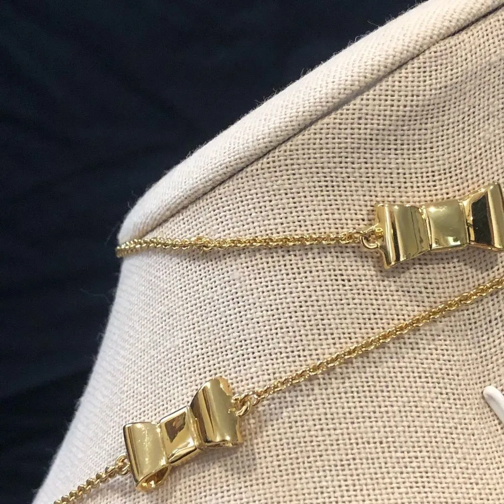 KATE SPADE Gold Tone Gold Enamel Bow Long Necklace - Image 13
