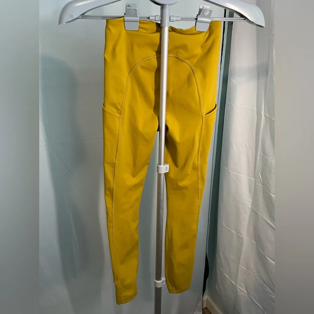 ATHLETA Ultimate Stash pocket mustard yellow‎ size XXS like new 7/8 length - Image 6