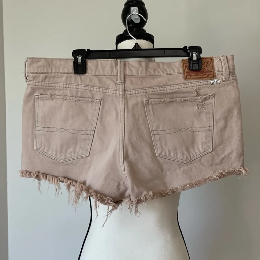 Lucky Brand distressed shorts in a size 14/32 - Image 2