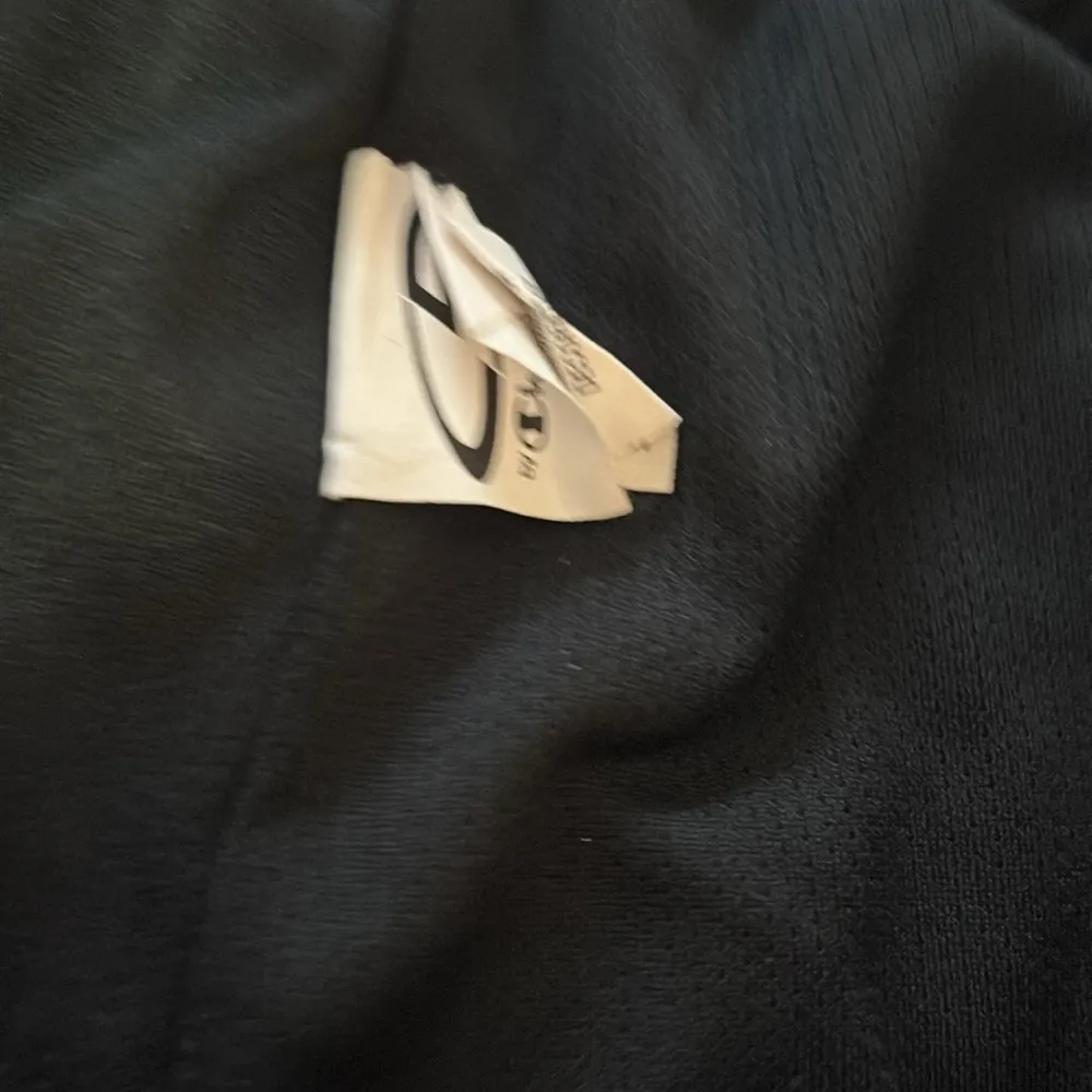 Champion Red Athletic Shorts with Drawstring Waist and Black Trim - Image 2